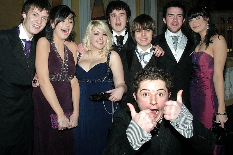 "Thumbs-up" for all systems go at the recent Loretto College formal eveing for these fun-loving students.
