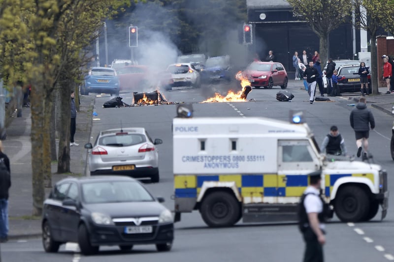LOYALIST PROTESTORS SET FIRE TO BINS AND BLOCK LANARK ROAD LAST NIGHT AS TENSIONS IN THE AREA BEGIN TO RISE.