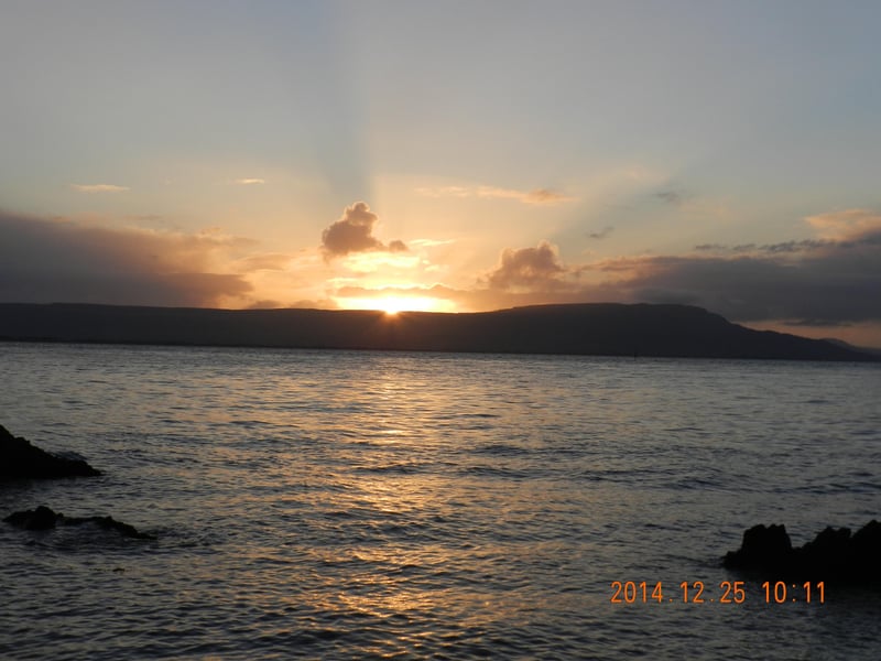 Sunrise at Glenburnie Beach, Moville photographed by local man, Enda Craig.
