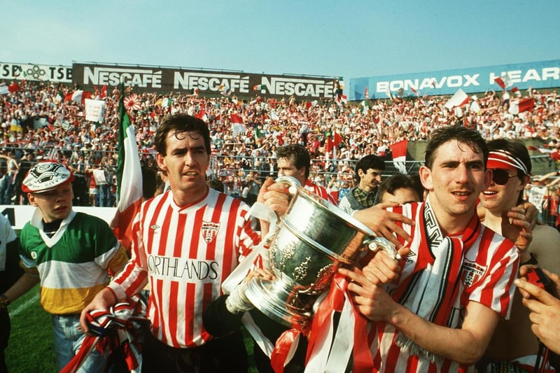 Derry City's Noel Larkin and Paul Carlyle celebrate their FAI Cup win over Cork City, at Dalymount Park, in 1989.