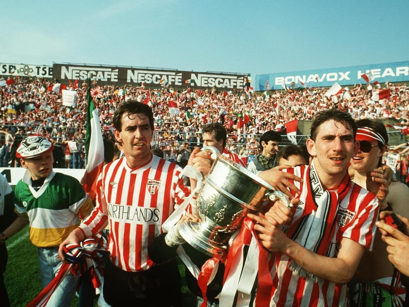 Derry City's Noel Larkin and Paul Carlyle celebrate their FAI Cup win over Cork City, at Dalymount Park, in 1989.