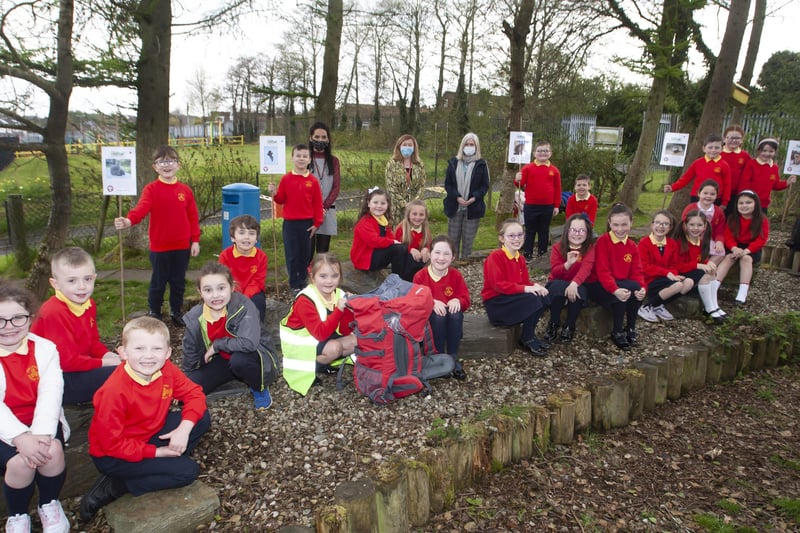 Mrs. Siobhan Gillen, principal, Miss Bronagh Lynch, teacher and Mrs Hutton, classroom assistant pictured with Miss Lynchâ€TMs P3A class in Steelstown PS Eco Garden.