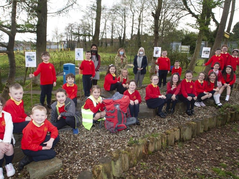 Mrs. Siobhan Gillen, principal, Miss Bronagh Lynch, teacher and Mrs Hutton, classroom assistant pictured with Miss Lynchâ€TMs P3A class in Steelstown PS Eco Garden.