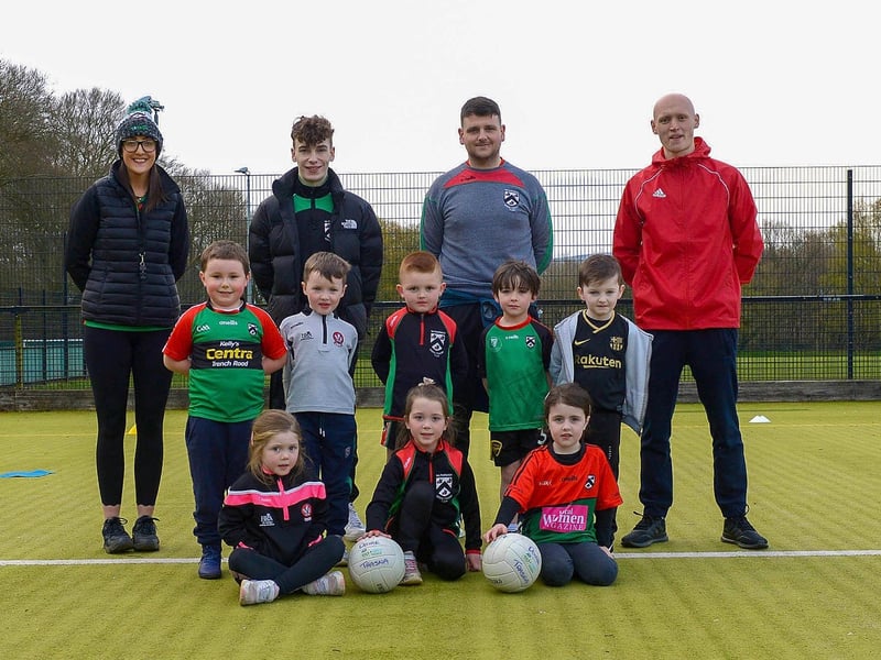 Doire Trasna nursery footballers pictured with coaches Nicole Simpson, Conor Kirkpatrick, Sean Fleming and Patrick McCarry during training recently at the Foyle Arena. DER2115GS – 050