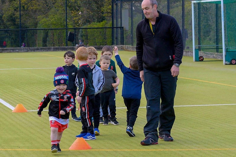 Doire Trasna coach Paul Simpson with nursery footballers at a recent training session at the Foyle Arena. DER2115GS – 058