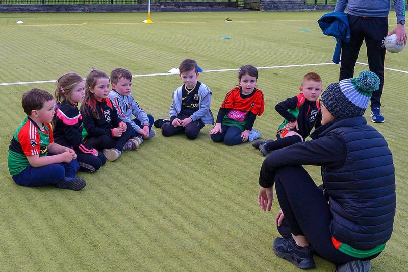 Doire Trasna coach Nicole Simpson with nursery footballers during a training session recently at the Foyle Arena. DER2115GS – 059