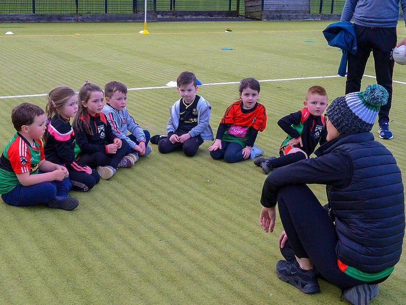 Doire Trasna coach Nicole Simpson with nursery footballers during a training session recently at the Foyle Arena. DER2115GS – 059