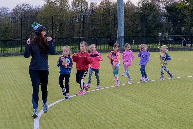 Áine Simpson, Doire Trasna coach, leads nursery footballers during a training session at the Foyle Arena recently. DER2115GS – 069