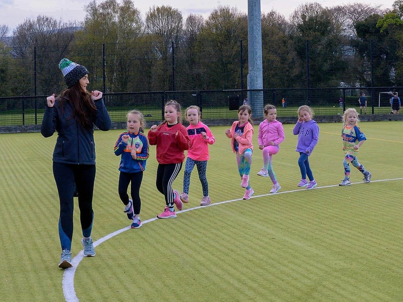 Áine Simpson, Doire Trasna coach, leads nursery footballers during a training session at the Foyle Arena recently. DER2115GS – 069