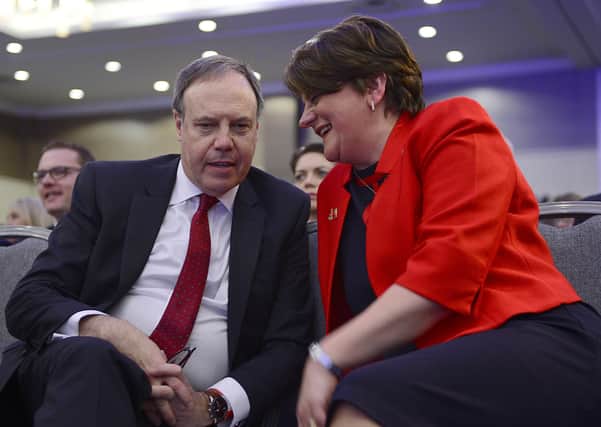 Arlene Foster with DUP deputy leader Nigel Dodds. Mrs. Foster has announced she will be stepping down as DUP leader next month.