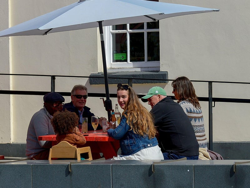 Customers enjoy drink outdoors as lockdown restrictions were further eased on Friday last. Photo: George Sweeney / Derry Journal. DER2117GS - 055