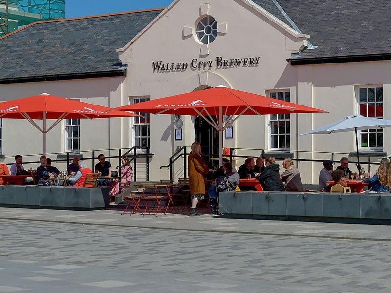 Customers enjoy food and drink outdoors as lockdown restrictions were further eased on Friday last. Photo: George Sweeney / Derry Journal. DER2117GS - 054