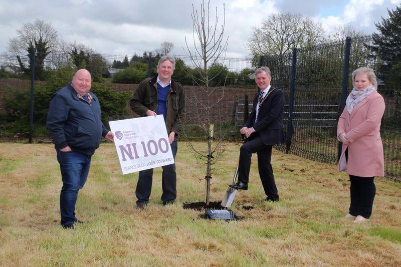 The Mayor of Causeway Coast and Glens Borough Council Alderman Mark Fielding plants a native oak tree at the Jim Watt Centre in Garvagh along with Councillor Adrian McQuillan, Councillor Richard Holmes and Councillor Michelle Knight McQuillan, Chair of Causeway Coast and Glens Borough Council's NI 100 Working Group