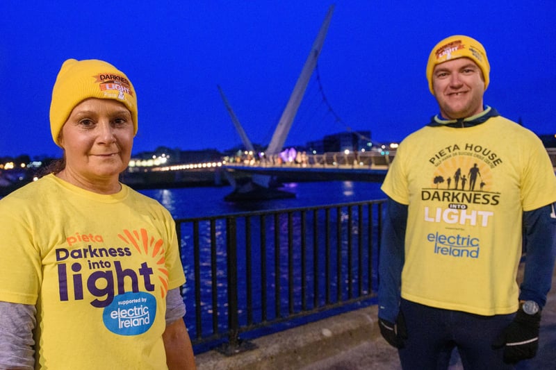 One Sunrise Together, Lorraine Carlin and Cormac Campbell pictured in Derry during the Pieta Darkness Into Light 2021 sunrise walk supported by Electric Ireland. Thousands of people across Ireland joined together, while apart, under one sunrise on Saturday morning to offer hope to those impacted by suicide and to raise vital funds to ensure Pieta and its partner Northern Ireland charities can continue to provide their life-saving services.
