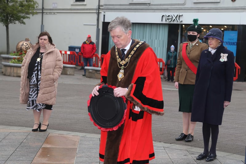 Mayor of Causeway coast and Glens Borough Council Cllr Mark Fielding lays a wreath in Coleraine on Saturday at the war memorial to mark VE day. Picture kevin McAuley/McAuley Multimedia