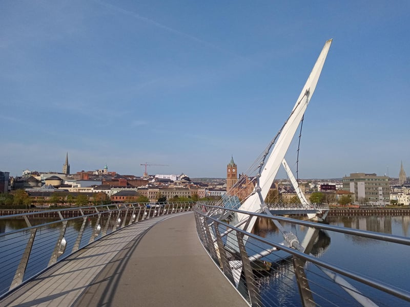 Derry's Peace Bridge and historic city centre.