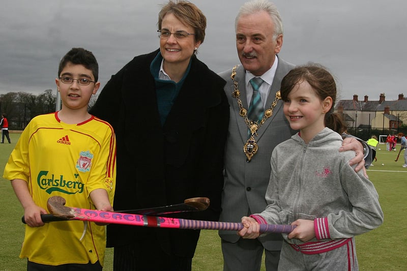 Social and Development minister Margaret Ritchie, MLA, accompanied by the Mayor of Londonderry Alderman Drew Thompson  with local school pupils Sorousa Azer and Zoe Hughes, when she officially opened the new   Synthetic Pitch at St.Columb,s Park in Derry.   The new £634,000 state of the art turf floodlight pitch will accommodate soccer, hockey, rugby and gaelic games. LS51-530MT.