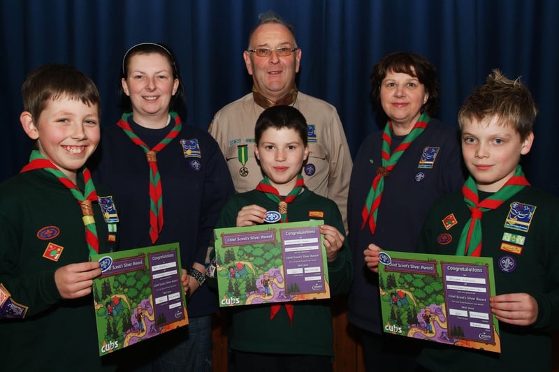 Richard Edgar, District Commissioner, pictured at the presentation of Chief Scout's Silver Awards to local cub scouts, from left, Ben Donnelly, Christopher Parke and Calum Watson, at Eglinton Church Hall. Included are, Lorna Borland and Carol Hinchcliff, leaders. This is the first time that the award has been achieved by cubs in the Londonderry District. LS51-189KM