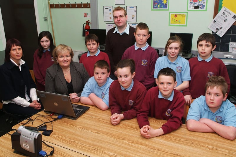 Northern Ireland Children's Commissioner Patricia Lewsley, seated second from left, pictured with P7 pupils during her recent visit to Craigbrack Primary School. Included are, Sinead Burley, teacher, and Niall Moore, Participation Officer, NICCY. LS17-112KM