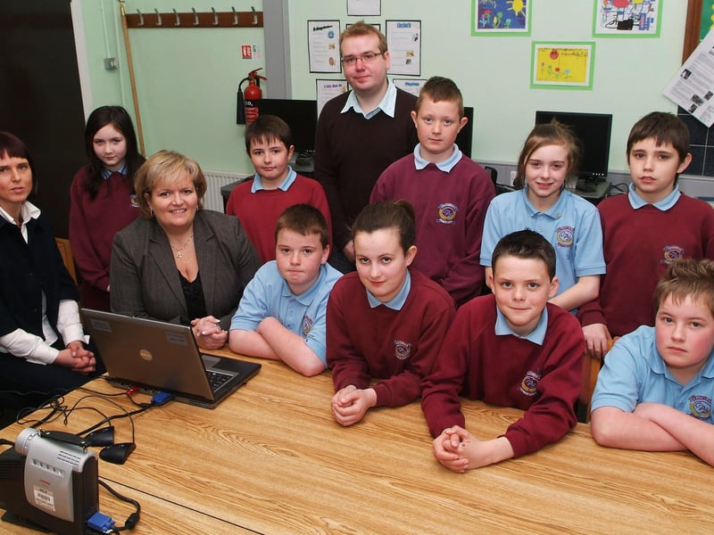 Northern Ireland Children's Commissioner Patricia Lewsley, seated second from left, pictured with P7 pupils during her recent visit to Craigbrack Primary School. Included are, Sinead Burley, teacher, and Niall Moore, Participation Officer, NICCY. LS17-112KM