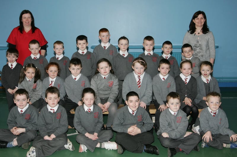 Holy Family PS students who completed their Paired Reading course pictured with teachers Caroline Morrisson and Mrs Stephenson.  (1104JB21)