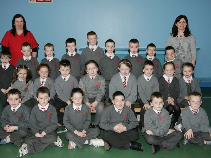 Holy Family PS students who completed their Paired Reading course pictured with teachers Caroline Morrisson and Mrs Stephenson. (1104JB21)