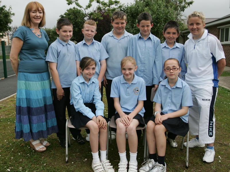 P7 teacher Mrs Bridget Devine and classroom assistant Louise Timoney of St. Eugene's PS, Victoria Bridge with P7 students. (1506JB03)
