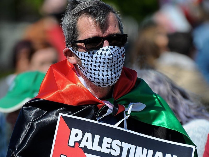 Protestor at the Palestinian solidarity Rally at Free Derry Wall on Saturday after last. Photo: George Sweeney. DER2120GS – 067