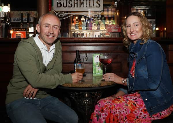 Alan and Jenna McGregor celebrate their 10th wedding anniversary with a drink in the Garrick Bar Belfast.

Belfast City Centre bars were open for business again after the recent lockdown restrictions were lifted.
