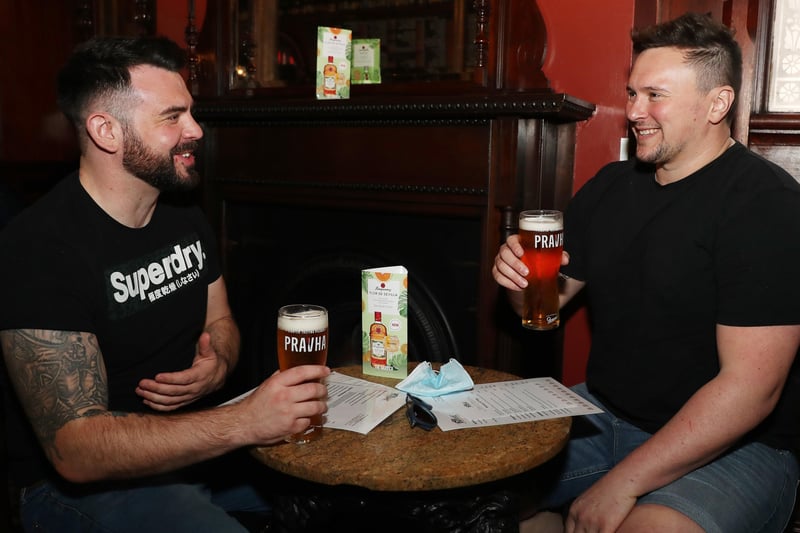 (L-R) Jordan Cinamon and Stephen Ferguson enjoy a drink in the Garrick Bar Belfast.

Belfast City Centre bars were open for business again after the recent lockdown restrictions were lifted.