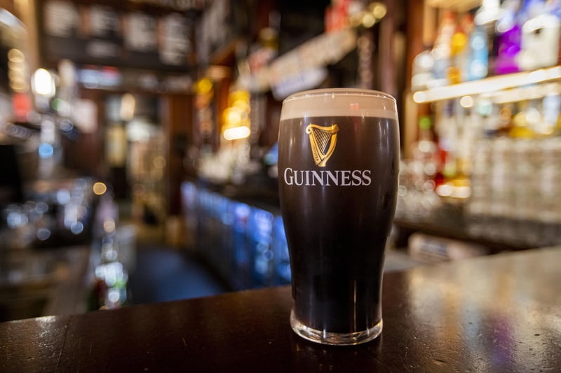 Pint of Guinness rests on the bar of The Garrick Bar in Belfast after the latest easing of the Covid-19 rules in Northern Ireland