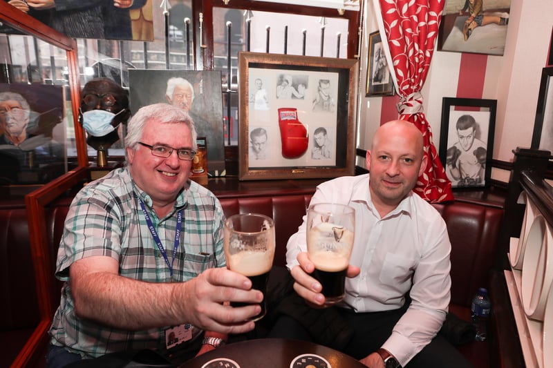 Punters Keith and Stephen enjoy a pint inside Bittles Bar in Belfast City Centre. 

Picture by Jonathan Porter/PressEye