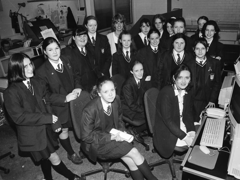 Bernadette Haughey, trainee compositor, with pupils from St. Cecilia’s Secondary School when they visited the Derry Journal offices. Included is Sharon Bergin, teacher.