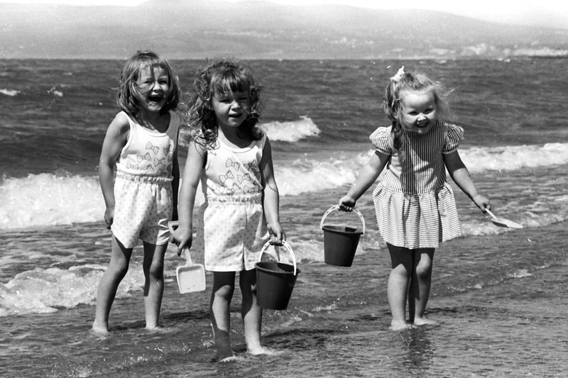 June... Paula and Catherine McGrory, from Mary Street, and Catherine Keeney, from Lisfannon Park, enjoy a sunny day at the seaside in Lisfannon.