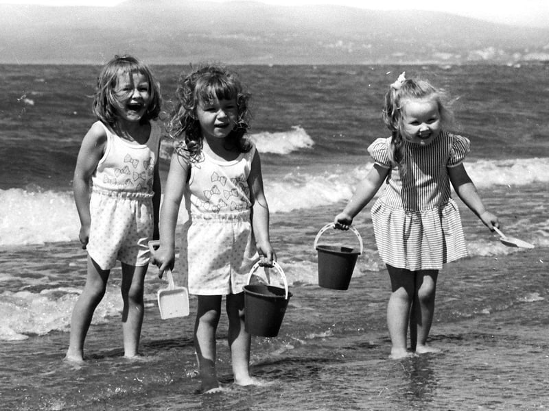 June... Paula and Catherine McGrory, from Mary Street, and Catherine Keeney, from Lisfannon Park, enjoy a sunny day at the seaside in Lisfannon.