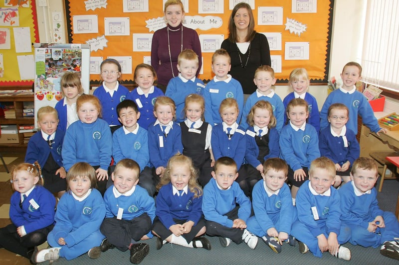 Smiling primary one's at Termoncanice Primary School with classroom assistant Oonagh Hartin and teacher Caroline O'Kane. LV39-704MML