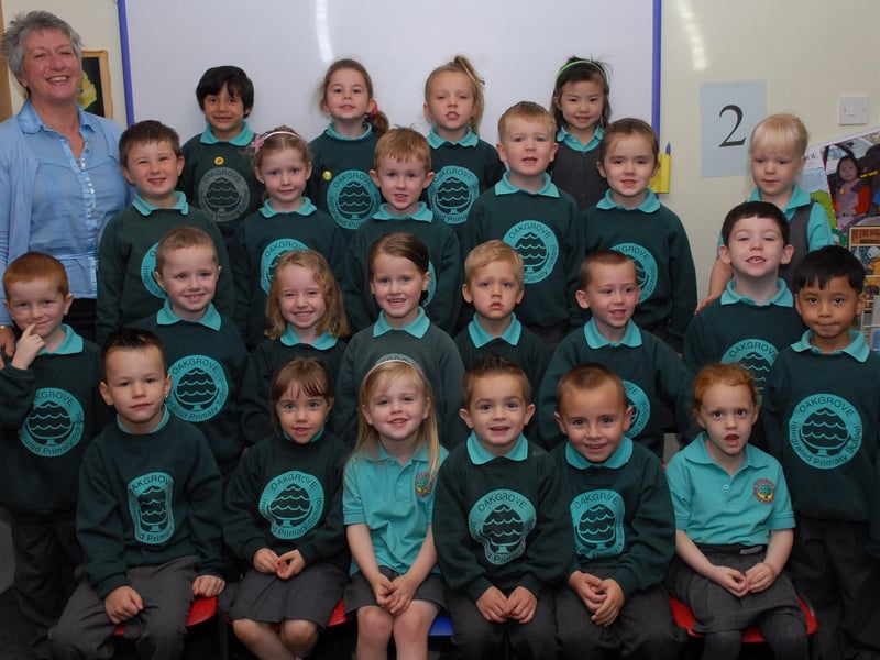 Gertrude Carey, class teacher, pictured with her P1 'A' class at Oakgrove Integrated Primary School. LS39-127KM