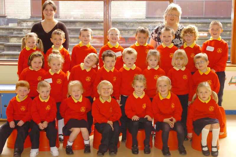 P1 pupils from Steelstown Primary School with Patricia Cavanagh, left, classroom assistant, and Charlotte Devine, teacher. (2109PG22)