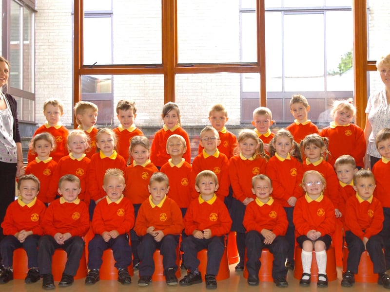 P1 pupils from Steelstown Primary School with Mrs O'Neill, left, teacher, and Miss McCafferty, classroom assistant. (2109PG21)