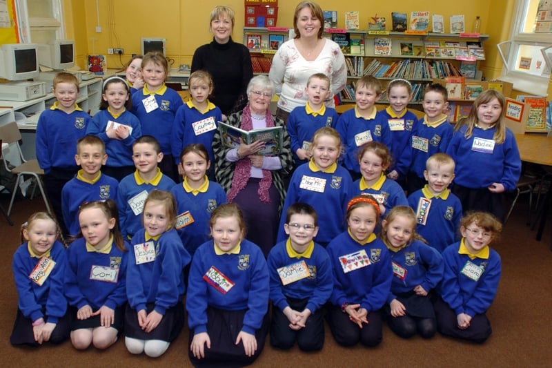 Pupils from Chapel Road PS who have taken part in a Primary 3 Literacy Project in conjunction with the Playhouse. Included, are Rosemary Quinn, storyteller and short story writer, Anne Kerr, teacher and Sharon Moran, education officer, Playhouse. (1204A11)