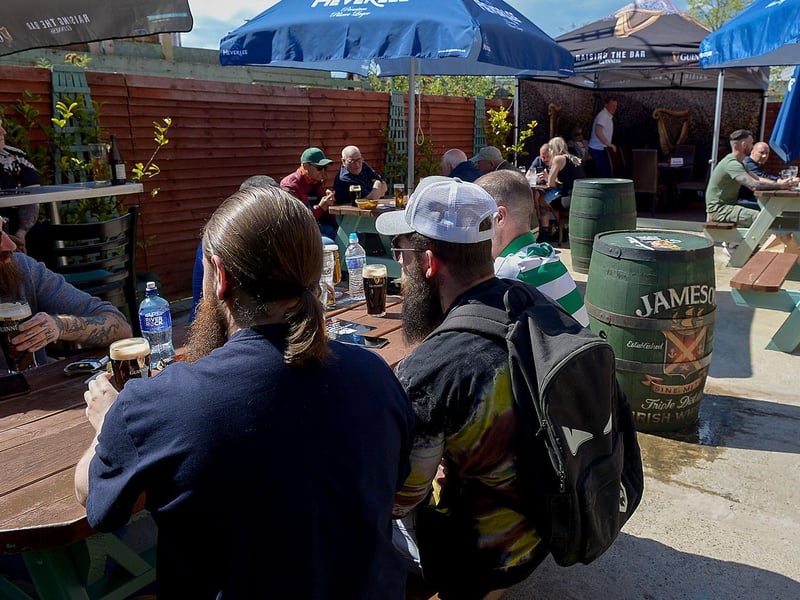 Customers enjoy a Bank Holiday weekend drink as pubs with outdoor service reopened on Friday last. Photo: George Sweeney / Derry Journal. DER2117GS - 046