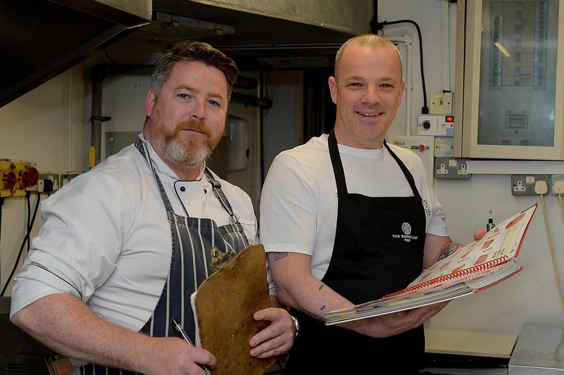 Sooty Olive Chef Micheál McDonald, on the left, and Head Chef / Proprietor Sean Harrigan discuss menus ahead of the hospitality sector reopening for indoor dining. Photo: George Sweeney / Derry Journal.  DER2120GS – 013