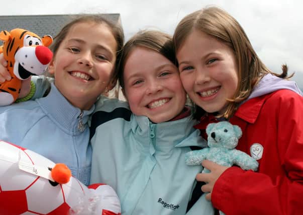 Leah Weatherup, Eileen Burns and Naomi Allen all from Ballyclare Primary School and having a great time at the Ballyclare May Fair in 2007.