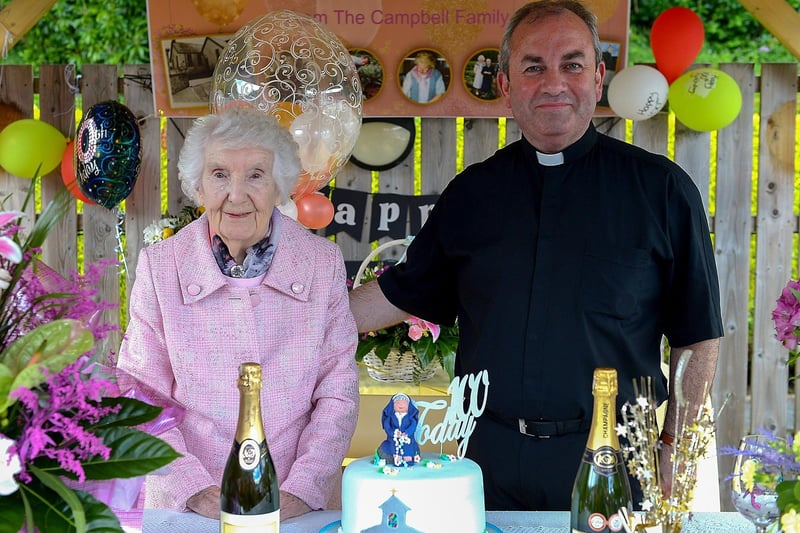 Sr. Philomena Donaghey who celebrated her 100th birthday at Nazareth House Fahan yesterday afternoon pictured with the Very Rev Francis Bradley PP., Buncrana. Photos: George Sweeney. DER2122GS – 051
