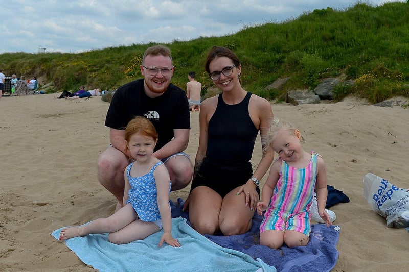 Shaun Doherty and Shanaen McCormack with Eireann McGilloway and Faye Quigley, from Derry, at Lady’s Bay beach, Buncrana yesterday afternoon.  DER2122GS – 016