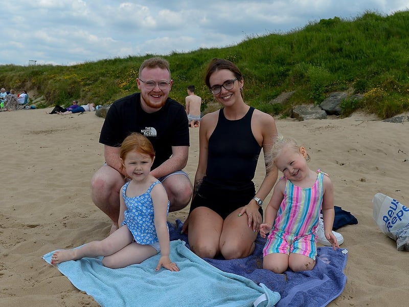 Shaun Doherty and Shanaen McCormack with Eireann McGilloway and Faye Quigley, from Derry, at Lady’s Bay beach, Buncrana yesterday afternoon.  DER2122GS – 016