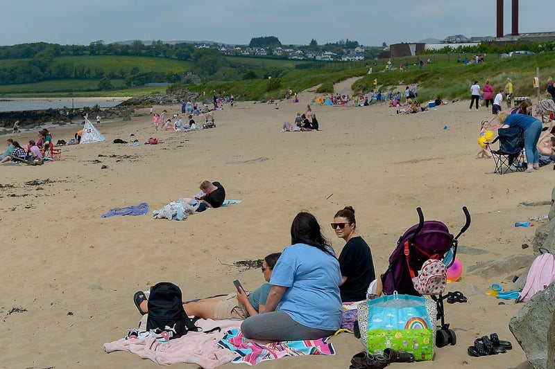 People enjoy the bank holiday sunshine at Lady’s Bay beach, Buncrana yesterday afternoon. Photos: George Sweeney. DER2122GS – 019