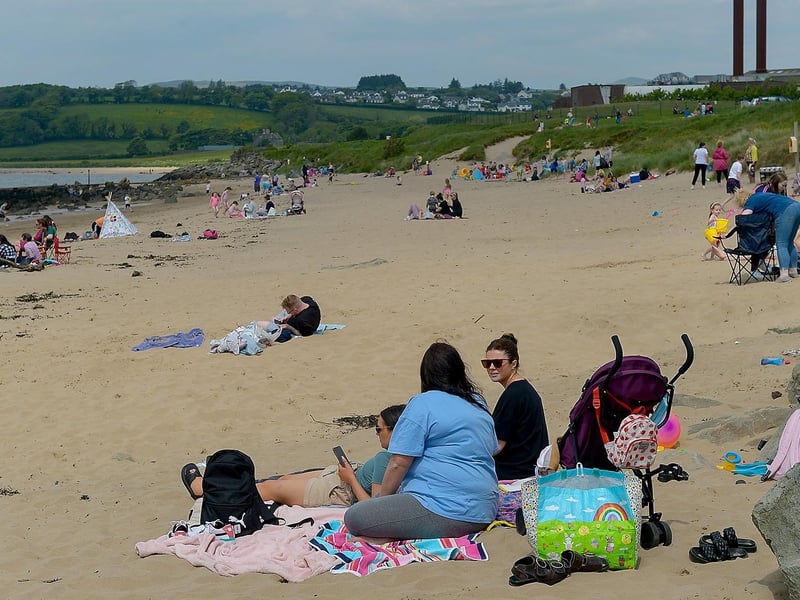 People enjoy the bank holiday sunshine at Lady’s Bay beach, Buncrana yesterday afternoon. Photos: George Sweeney. DER2122GS – 019