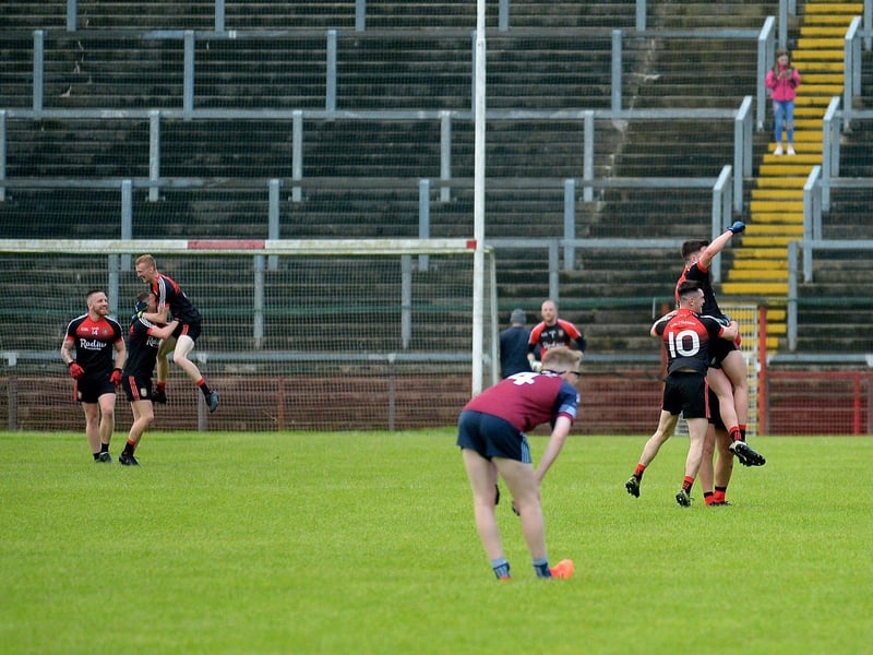 Sean Dolans players celebrate after defeating Glack in the Neal Carlin Cup final in Celtic Park on Friday evening last. (Photo: George Sweeney)