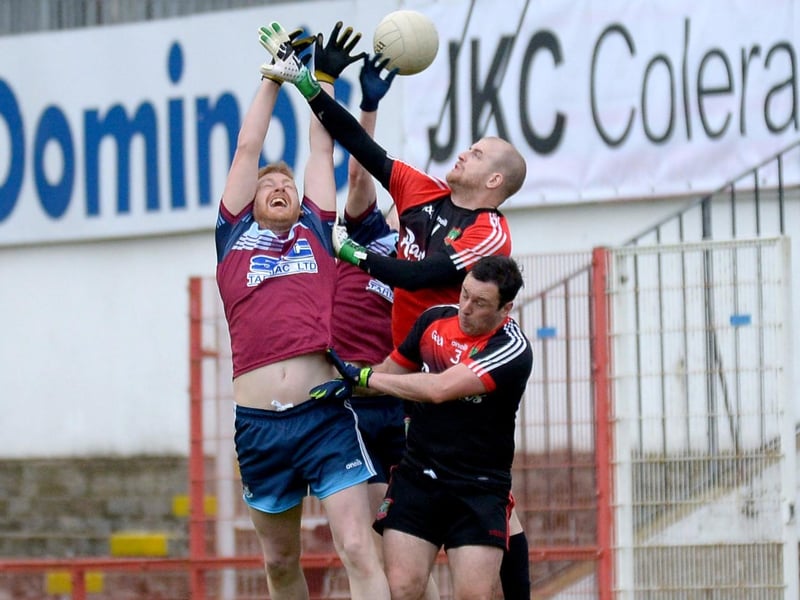 Sean Dolans keeper Dylan Carr contests a high ball during the game against Glack, in Celtic Park, on Friday evening last. (Photo: George Sweeney)